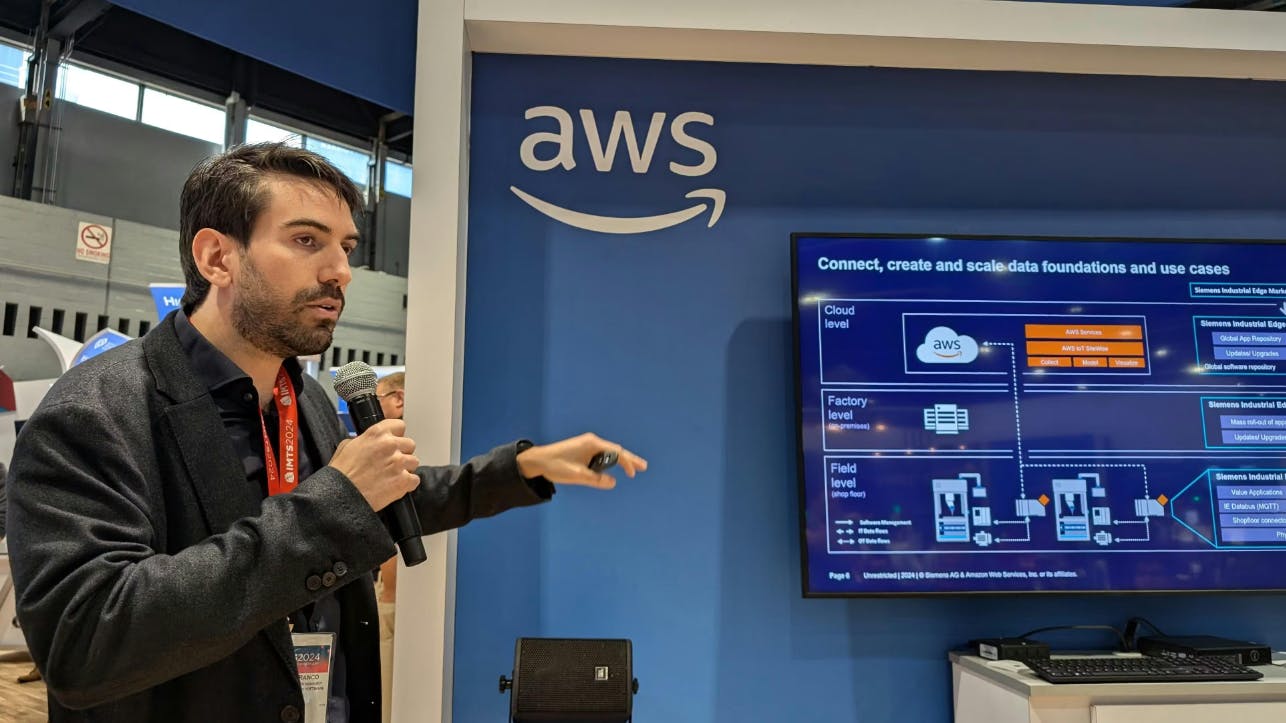 Francisco Javier Franco Espinoza, a strategy and innovations manager for Siemens Factory Automation, discusses digital manufacturing in the AWS booth.