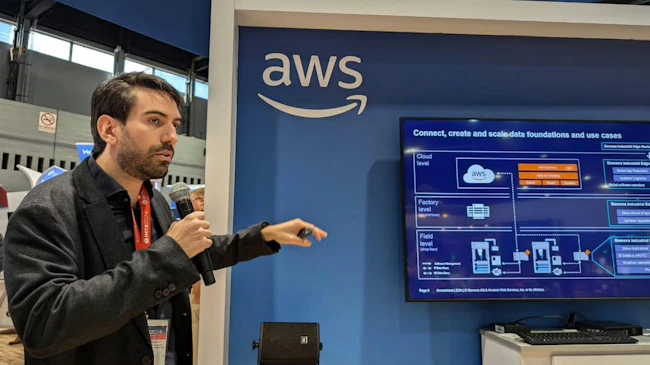 Francisco Javier Franco Espinoza, a strategy and innovations manager for Siemens Factory Automation, discusses digital manufacturing in the AWS booth.