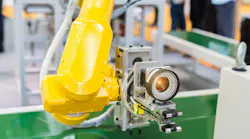 A robotic machine vision system in a factory.