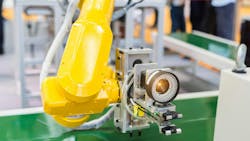 A robotic machine vision system in a factory. A robotic machine vision system in a factory.