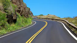 A stretch of winding highway along the Maui coastline in Hawaii. A stretch of winding highway along the Maui coastline in Hawaii.