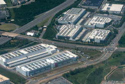 An aerial view of a dense cluster of data centers, including facilities under construction, in Ashburn, Virginia, which sits in tech-rich Loudoun County outside Washington, D.C.