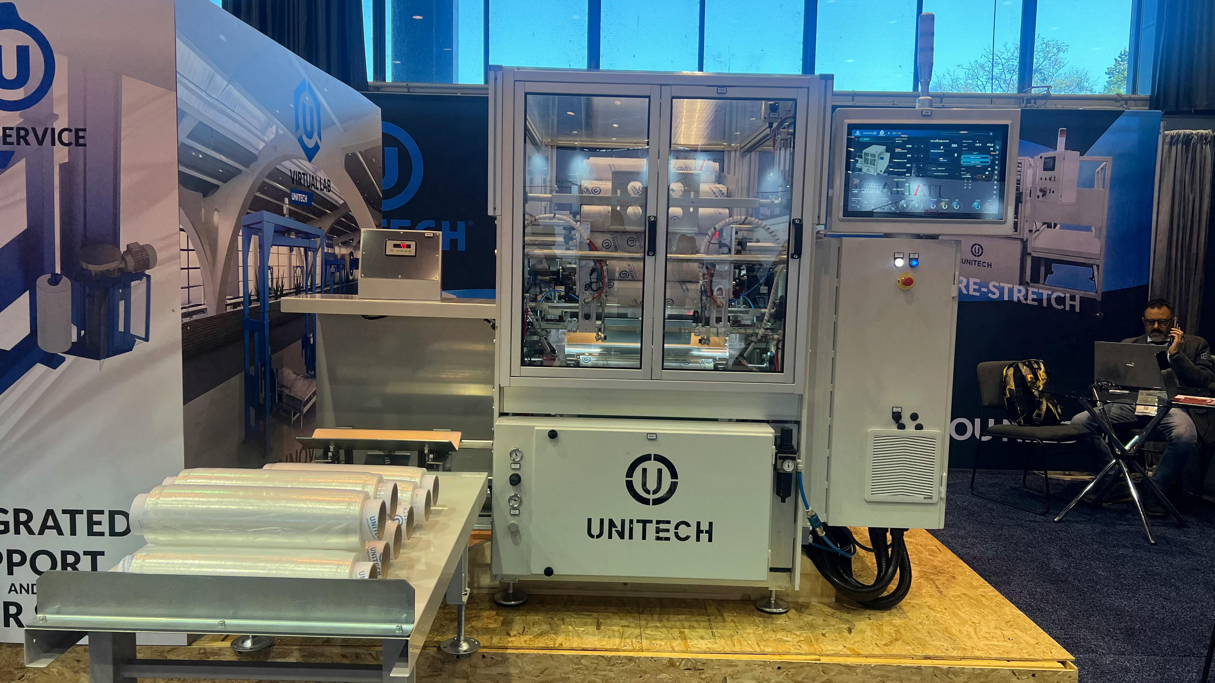 The Model T012 Automatic PreStretched Film Rewinder showcased at PACK EXPO 2026 in Chicago.